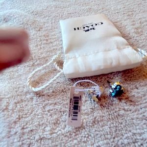 Brand new COACH EARRINGS- They are silver, and a turquoise glittery color.